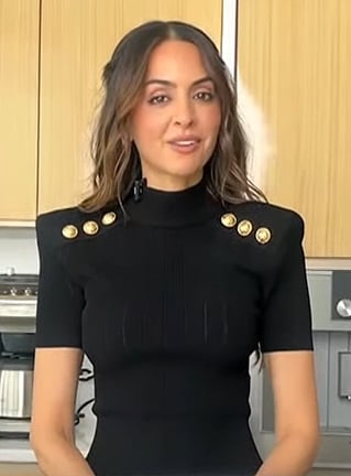 Monda Vand's black button shoulder dress on Extra