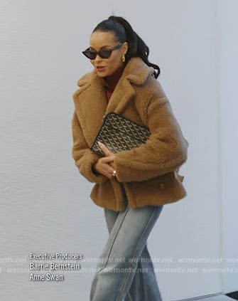 Sai's brown teddy jacket and jeans on The Real Housewives of New York City