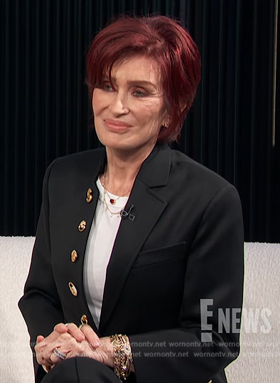 Sharon's black embellished button blazer on E! News