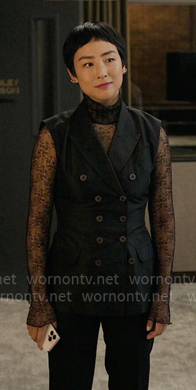 Stella's lace turtlneck and double breasted vest on The Morning Show