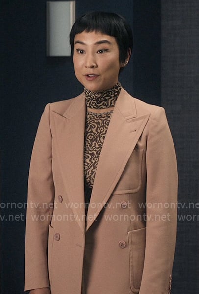 Stella's printed mesh top and blush blazer on The Morning Show