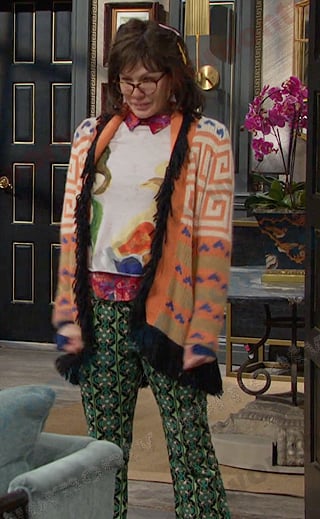 Susan's orange cardigan and green print pants on Days of our Lives