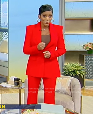 Tamron's red blazer and pants on Tamron Hall Show