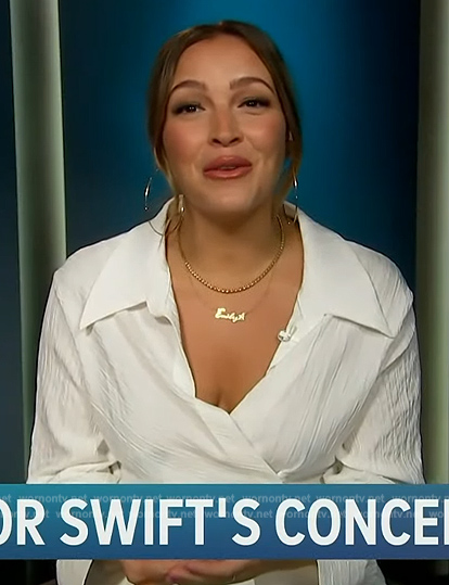 Emily Orozco's white textured wrap blouse on Access Hollywood