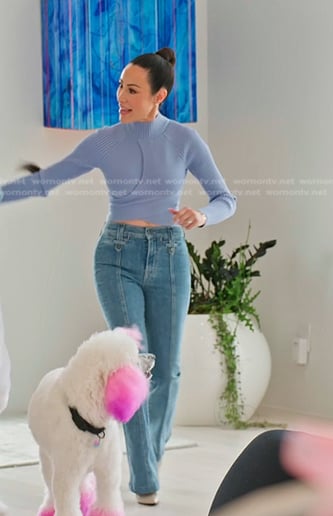 Angie's blue cutout sweater and jeans on The Real Housewives of Salt Lake City