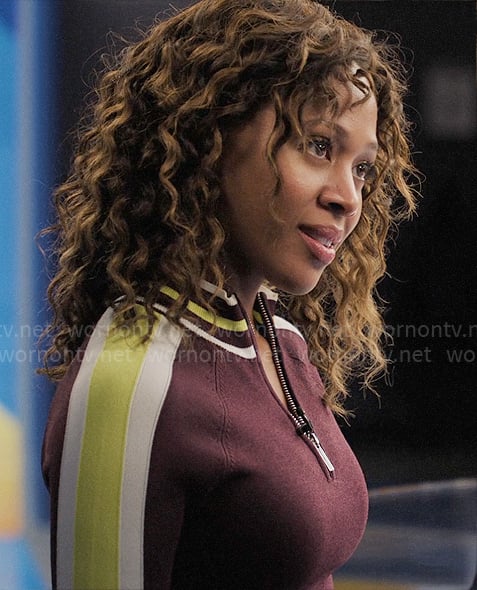 Chris's burgundy knit dress with striped sleeves on The Morning Show