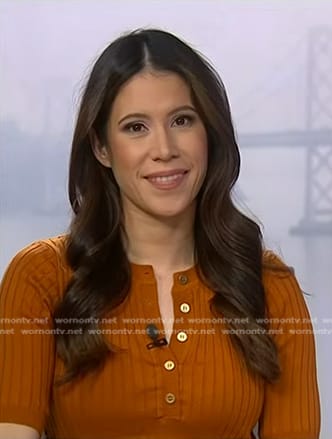 Deirdre's orange ribbed top on NBC News Daily