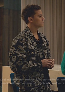 Ivan's black dragon print jacket and pants on Elite