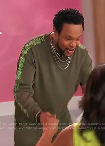 Jawn Murray's green printed sleeve sweatshirt on Sherri
