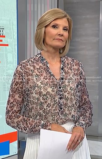 Kate's floral sheer blouse and white pleated skirt on NBC News Daily