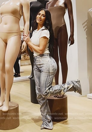 Kim's blue printed jeans on The Kardashians