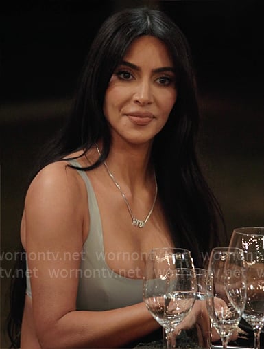 Kim's leather bra top on The Kardashians