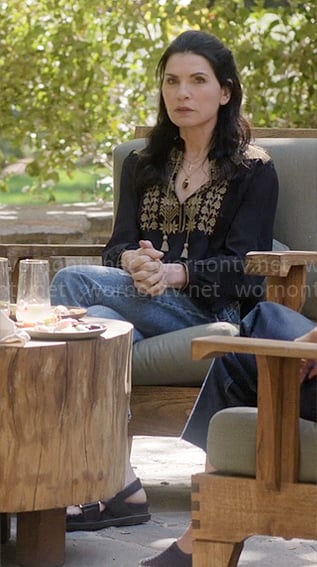 Laura's black embroidered top on The Morning Show