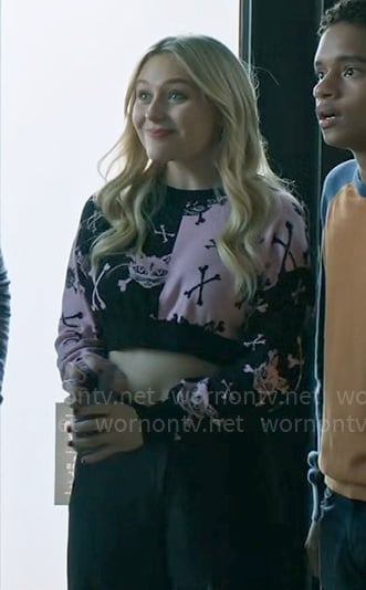 Lexy's pink cropped skull sweater on Chucky