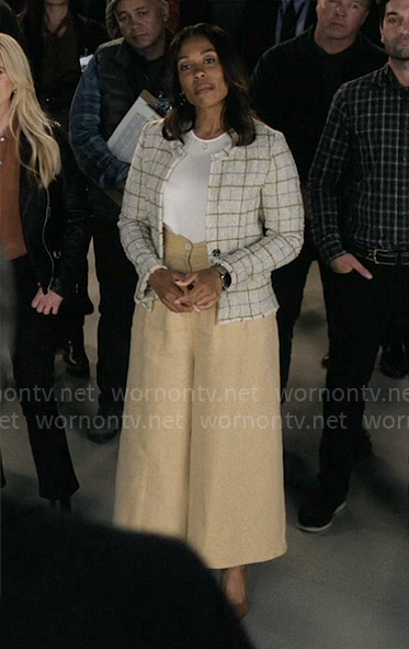 Mia's checked tweed jacket on The Morning Show