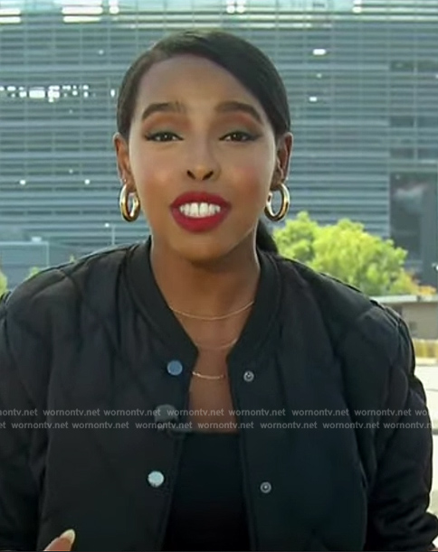 Mona's black quilted bomber jacket on Extra