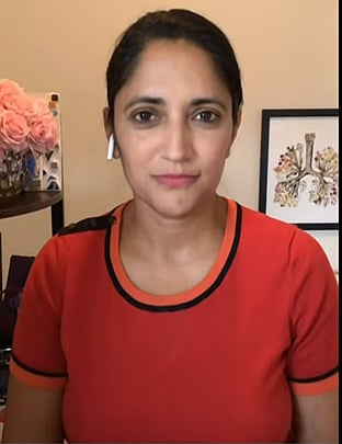 Dr Kavita Patel's red contrast stripe top on NBC News Daily