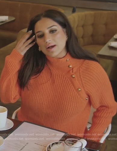 Leva's orange knit button detail sweater on Southern Charm