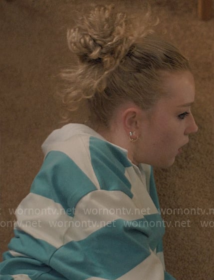 Shelby's turquoise striped polo shirt on American Horror Stories