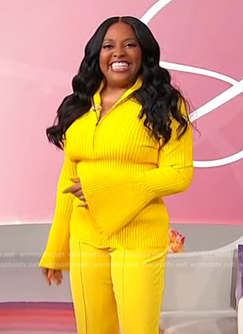 Sherri's yellow ribbed bell sleeve top on Sherri