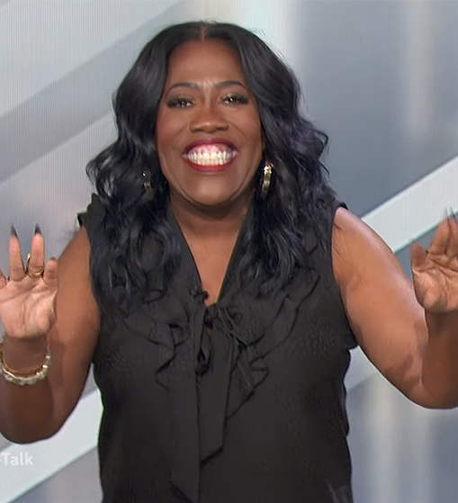 Sheryl's black sleeveless ruffle top on The Talk