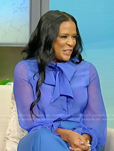 Tonesa Welch's blue sheer tie neck blouse on Tamron Hall Show