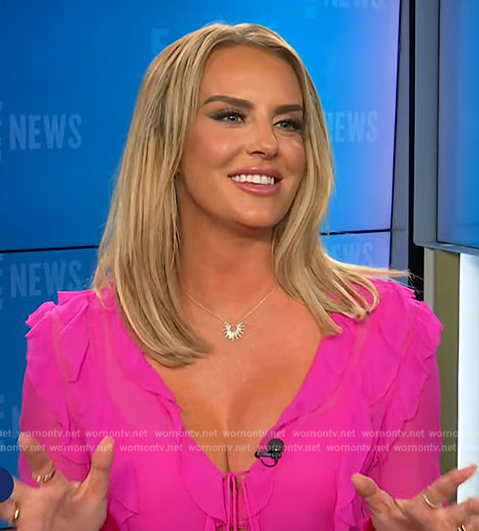 Whitney Rose's pink ruffle blouse on E! News