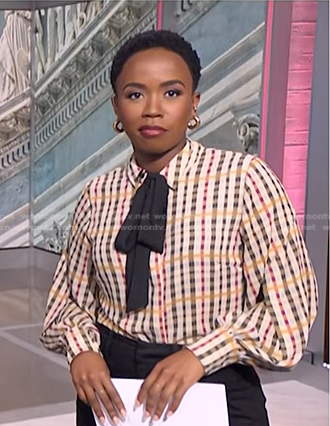 Zinhle's multicolor plaid tie neck blouse on NBC News Daily