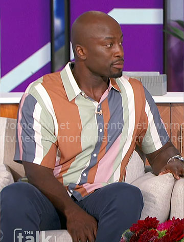 Akbar's colorblock shirt and green sneakers on The Talk