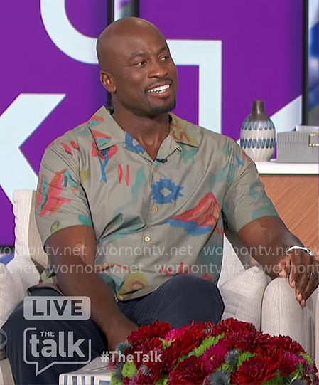 Akbar's green motif printed shirt and red sneakers on The Talk