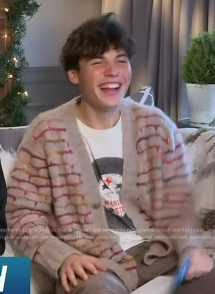 Brady Noon's beige stripe cardigan on Access Hollywood