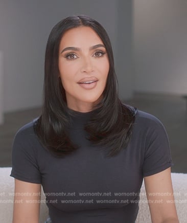 Kim's black confessional tee on The Kardashians