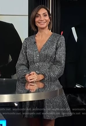 Courtney Lopez's gray metallic long sleeve dress on E! News