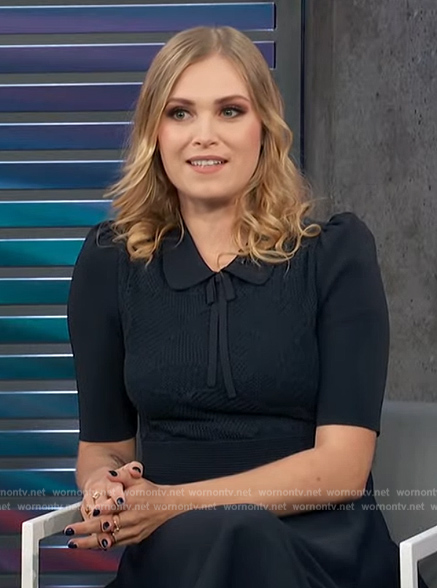 Eliza Taylor's navy pointelle knit dress on Access Hollywood