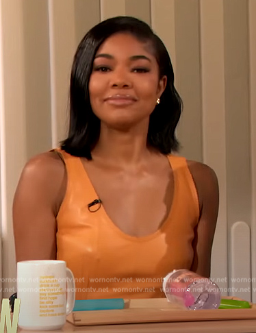 Gabrielle Union's orange leather dress on The Drew Barrymore Show