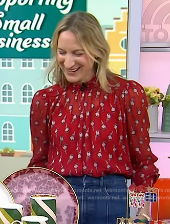 Lauren Iannotti's red floral print blouse