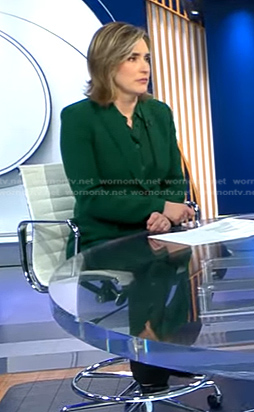 Margaret's green pant suit on CBS Evening News