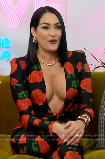 Nikki's black rose print jumpsuit on Access Hollywood