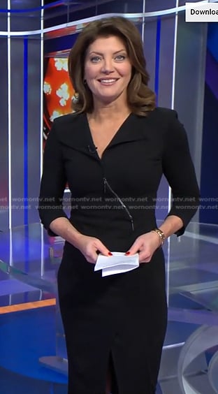 Norah's black zip front sheath dress on CBS Evening News