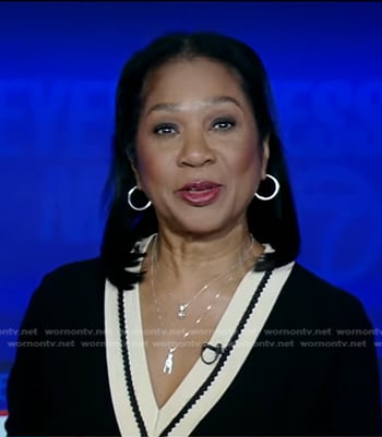 Sandra Bookman's black contrast v-neck sweater on Good Morning America
