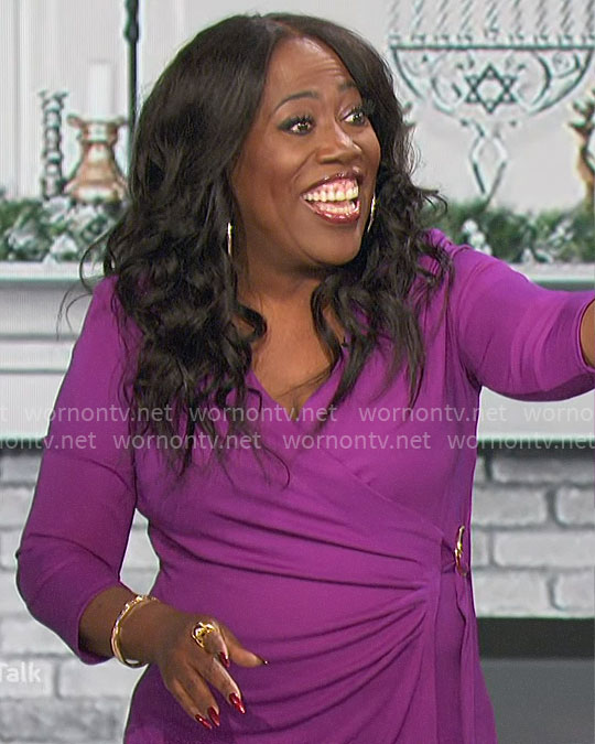 Sheryl's purple wrap top on The Talk