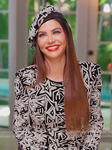 Adriana's black star embellished confessional dress on The Real Housewives of Miami