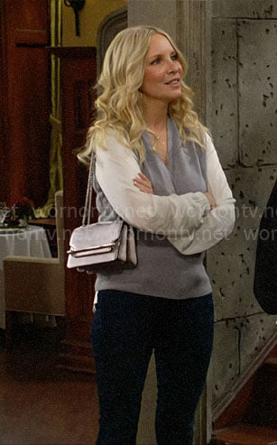Christine's grey wrap sweater with white sleeves on The Young and the Restless