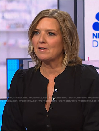 Christine Romans's black puff sleeve top on NBC News Daily