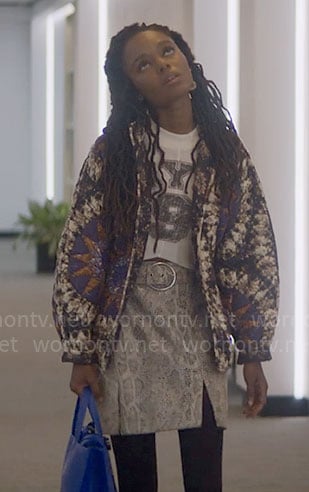 Hazel's printed quilted jacket with grey snake print skirt and NYC crop top on The Other Black Girl