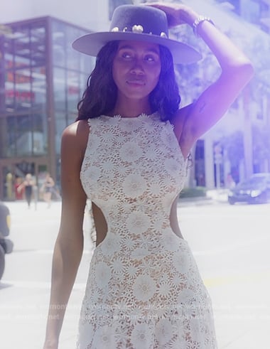 Kiki's white floral lace cutout dress on The Real Housewives of Miami