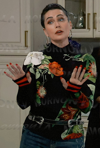 Lois's floral turtleneck sweater, double buckle belt and gold earrings on General Hospital