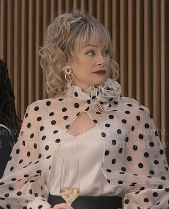 Maisy's polka dot overlay blouse on The Other Black Girl