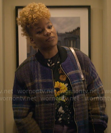Malaika's plaid bomber jacket on The Other Black Girl