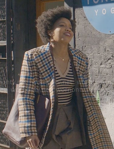Nella's houndstooth coat on The Other Black Girl